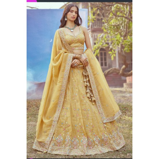 Designer Yellow Multicolor Embroidered Silk Lehenga Choli with Tassel Dupatta