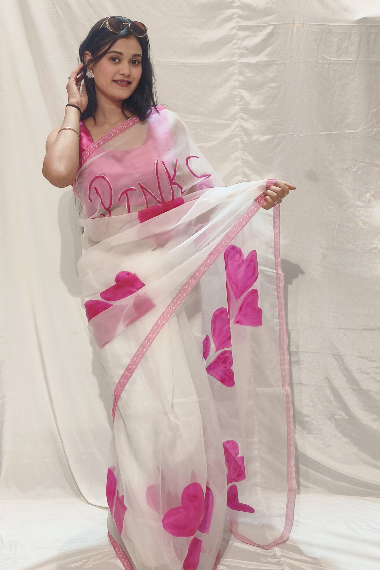 Heartfelt Hues Handpainted White Organza Saree with Pink Motifs
