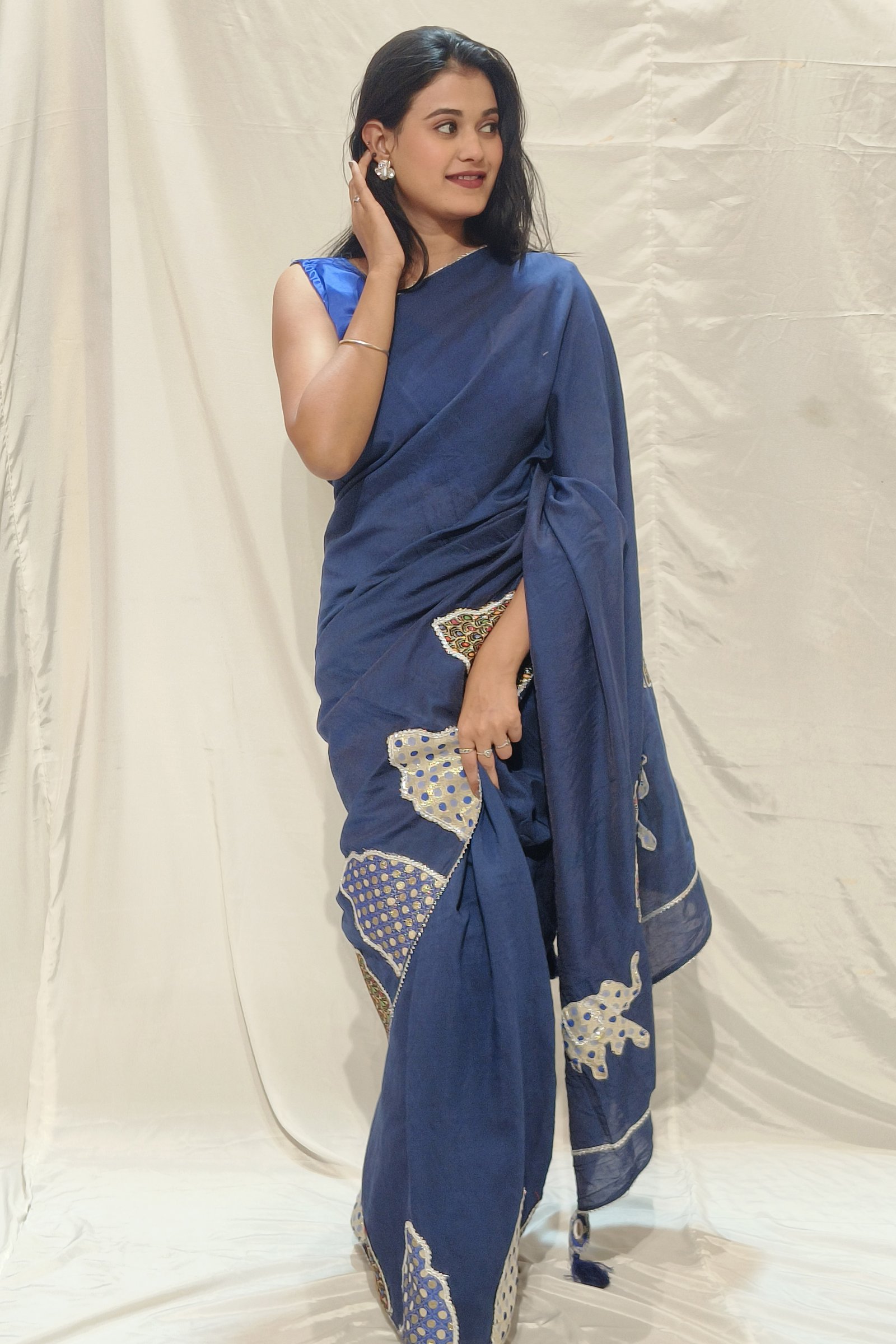 Royal Parade: Handpainted Navy Blue Saree with Elephant Motifs