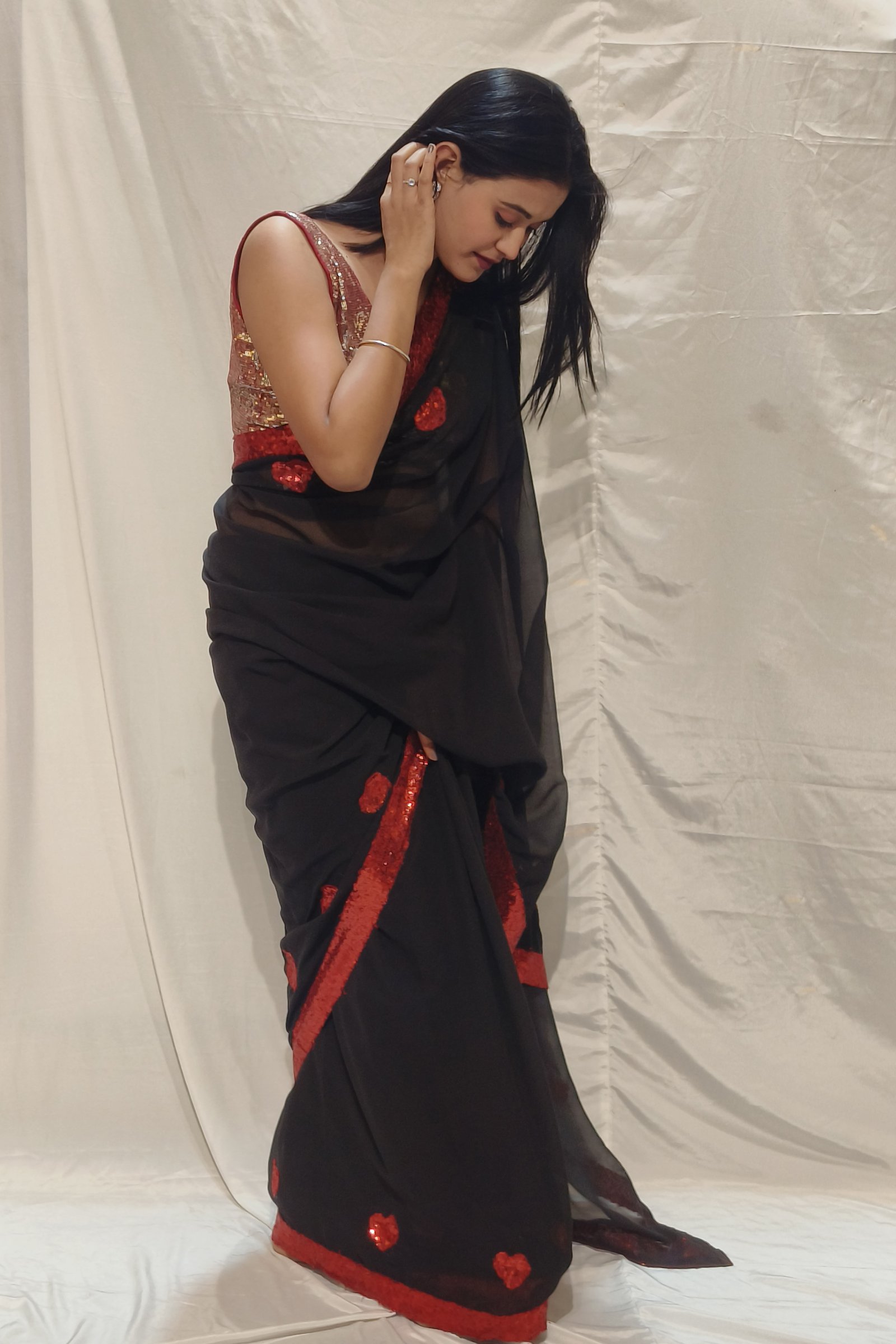 Midnight Love: Black Handpainted Saree with Red Heart & Sequin Embellishments